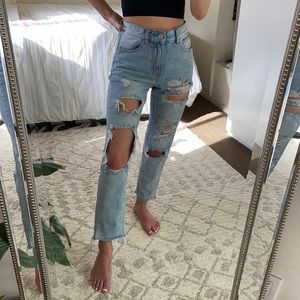 Light wash blue distressed highwaisted denim jeans